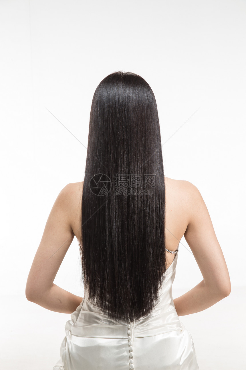 平滑的20到24岁黑发有着柔顺的长发的美女图片