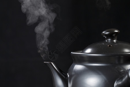 飞翔的热气器药罐子陶罐传统文化水壶背景