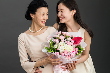 灰色花朵优美单亲家庭20到24岁幸福母女背景