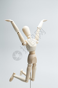 人体平衡人类形象玩具高举手臂木偶背景