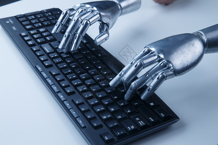 人工智能金属质感网络机械手与键盘背景图片
