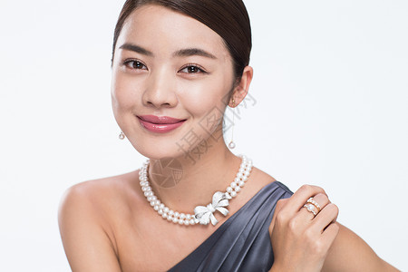 珠宝摄影摄影高贵东方人漂亮的青年女人的肖像背景