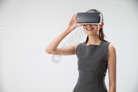 3D商务人青春乐趣高雅戴着VR眼镜的青年女人背景