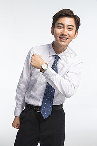 仅男人幸福20多岁戴着腕表的商务青年男人高清图片