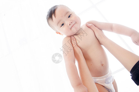 抱手女人摄影6到12个月儿子摄影母亲和男婴儿背景