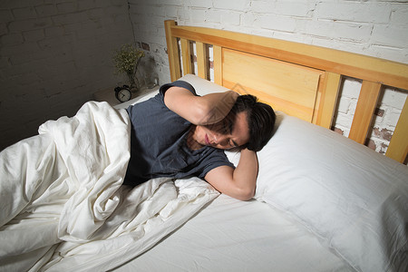 睡眠问题仅一个人东方人亚洲青年男人失眠背景