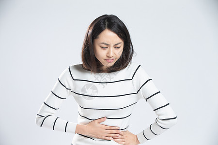 脾胃虚弱东方人皱眉头人青年女人肚子疼背景