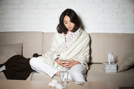 彩色格子沙发彩色图片压力亚洲人青年女人生病背景