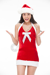 站着活力无忧无虑穿圣诞服的年轻女人图片