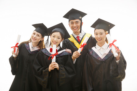 高等教育大学生穿着学士服庆祝毕业高清图片