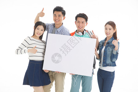 广告魅力站着男朋友成一排四个年轻的大学生拿着白板背景