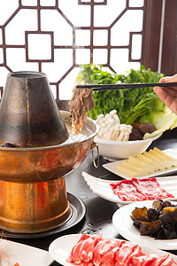 传统筷子切片食物涮羊肉背景图片
