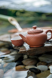 岩石茶杯饮料茶壶背景图片