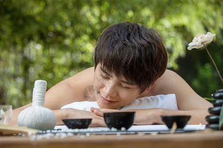 专业户外用品纯洁植物温泉疗法舒适年轻男人做spa背景