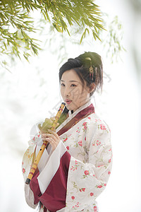 吹笛子的仙女古典式戏剧表演女人古装美女吹笛子背景