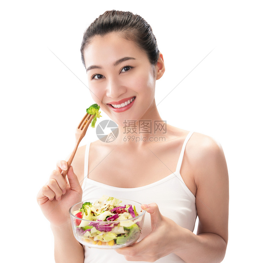 瘦身身体保养青年女人吃沙拉图片