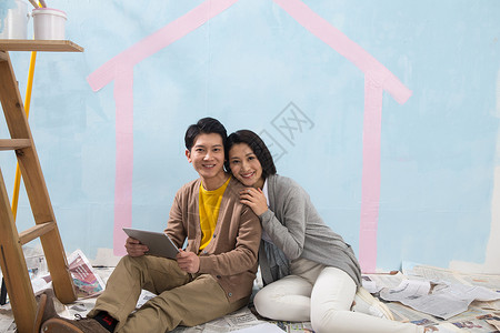 房地产愉悦ipad年轻夫妇装修房子图片