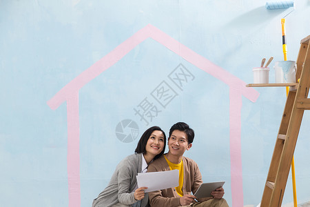 平板壁画快乐享乐20多岁年轻夫妇装修房子背景