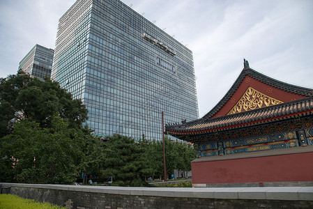 古典地产LOGO北京西直门建筑群和道路背景