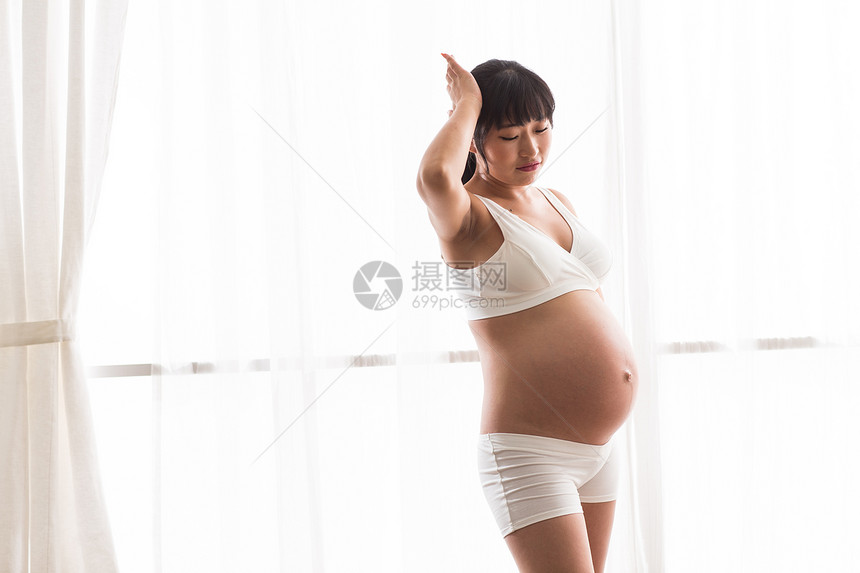 简单人东亚幸福的孕妇图片