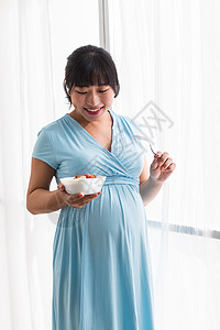 温馨新生活骄傲幸福的孕妇图片