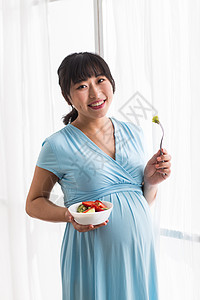 新草莓亚洲蔬菜吃幸福的孕妇背景
