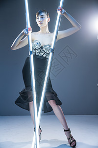 灯管符号时尚感符号能源科幻女郎背景