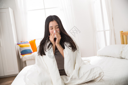 起床人亚洲青年女人生病图片