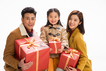 亚洲人幸福快乐家庭拿着礼物图片