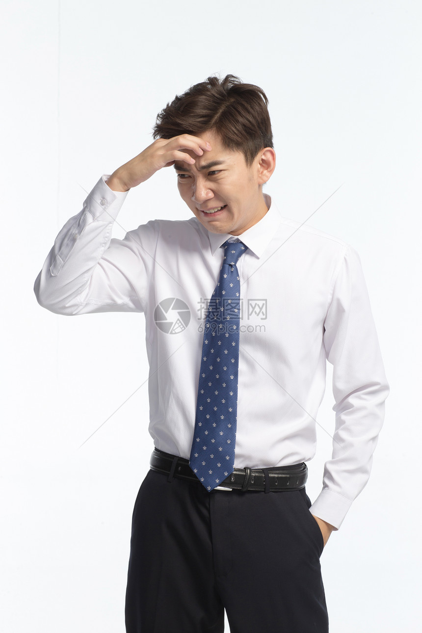 衬衫领带25岁到29岁商务面部表情痛苦的青年男人图片