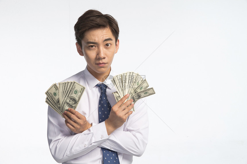 财会享乐衬衫领带商务青年男人拿着美元图片