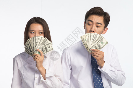 水平构图办公室职员20多岁商务青年男女拿着美元高清图片