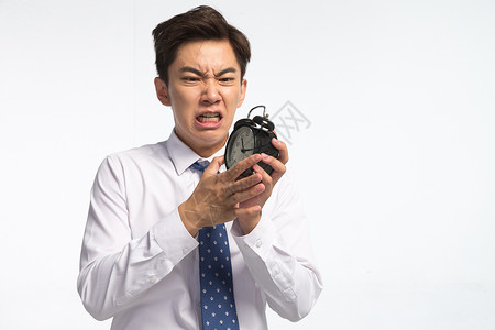 摄像机标志健康的生气仅成年人商务青年男人拿着闹钟背景