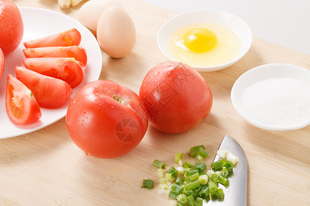 盐新鲜膳食炒西红柿鸡蛋的食材背景图片