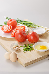 创意大蒜炒西红柿鸡蛋的食材背景