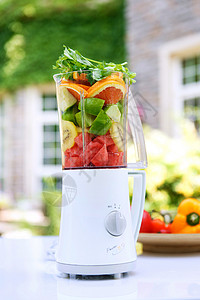 生态厨房静物蔬菜营养装满水果的榨汁机背景
