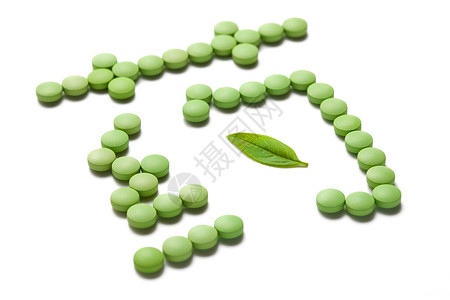 叶子字素材绿色药片组成的药字背景