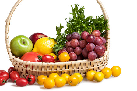 一篮子小葡萄青菜黄色静物蔬菜水果背景