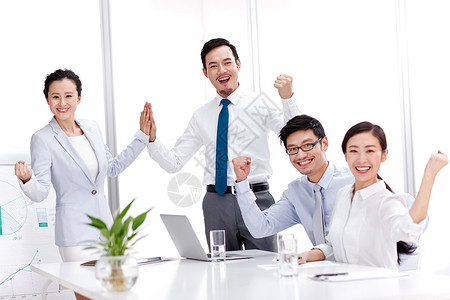 男人白领女人兴奋的商务团队图片
