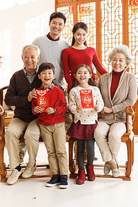 儿童摄影广告全家福摄影注视镜头幸福家庭过新年背景