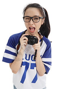 独立东方人年轻女人拿着照相机图片