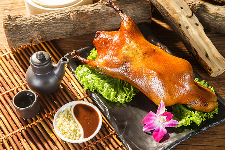 柴火菜特色北京烤鸭背景图片