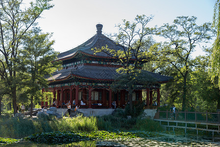 北京人遗址亭台楼阁河流北京圆明园公园背景