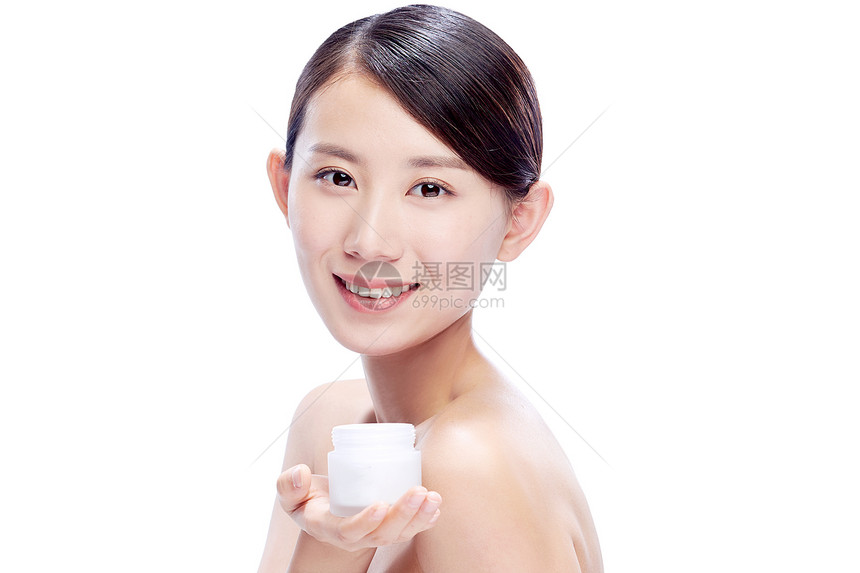 仅一个青年女人亚洲人正面视角年轻美女拿着润肤霜图片