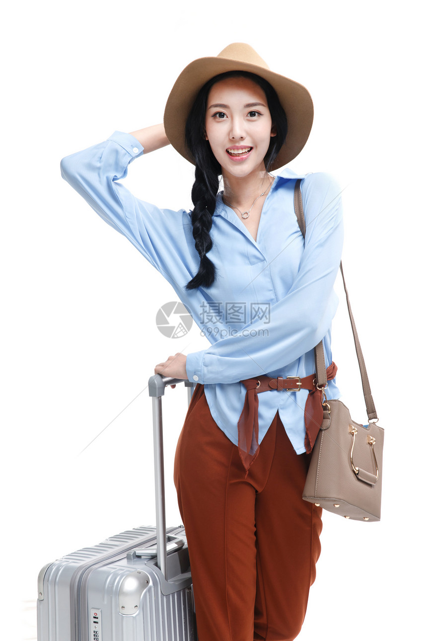 欢乐遮阳帽站着青年女人旅行图片