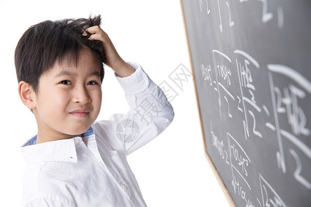 人个沮丧小学男生被数学题难住图片
