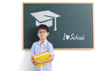 教科书知识拍摄环境小学男生站在黑板前高清图片
