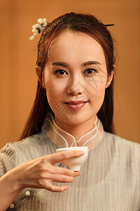 古典风格女人喝茶高清图片