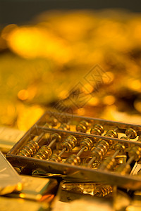 金条货币金色算盘和黄金图片