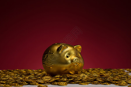 户内亚洲银行业存钱罐和金币图片